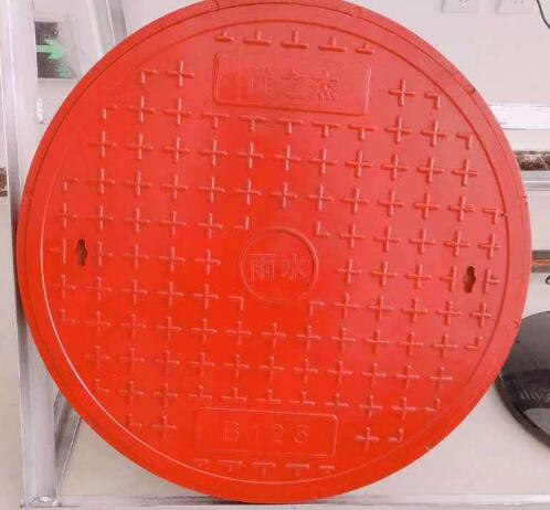 Red manhole cover